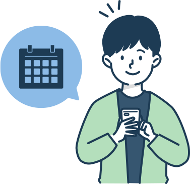 スマートフォンで予約を取る男性